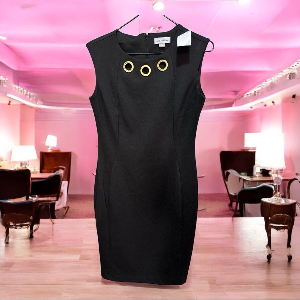 Elegant Black Dress with Gold Accents